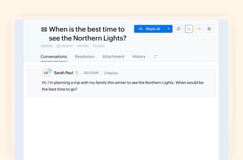 Zoho Desk screenshot: Ticket conversation with reply button