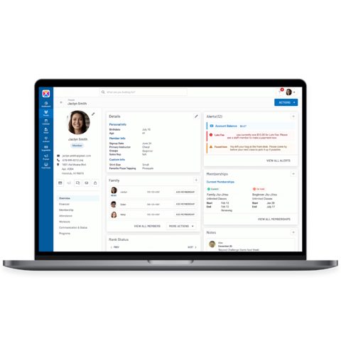 Zen Planner screenshot: Member profile with schedule on laptop